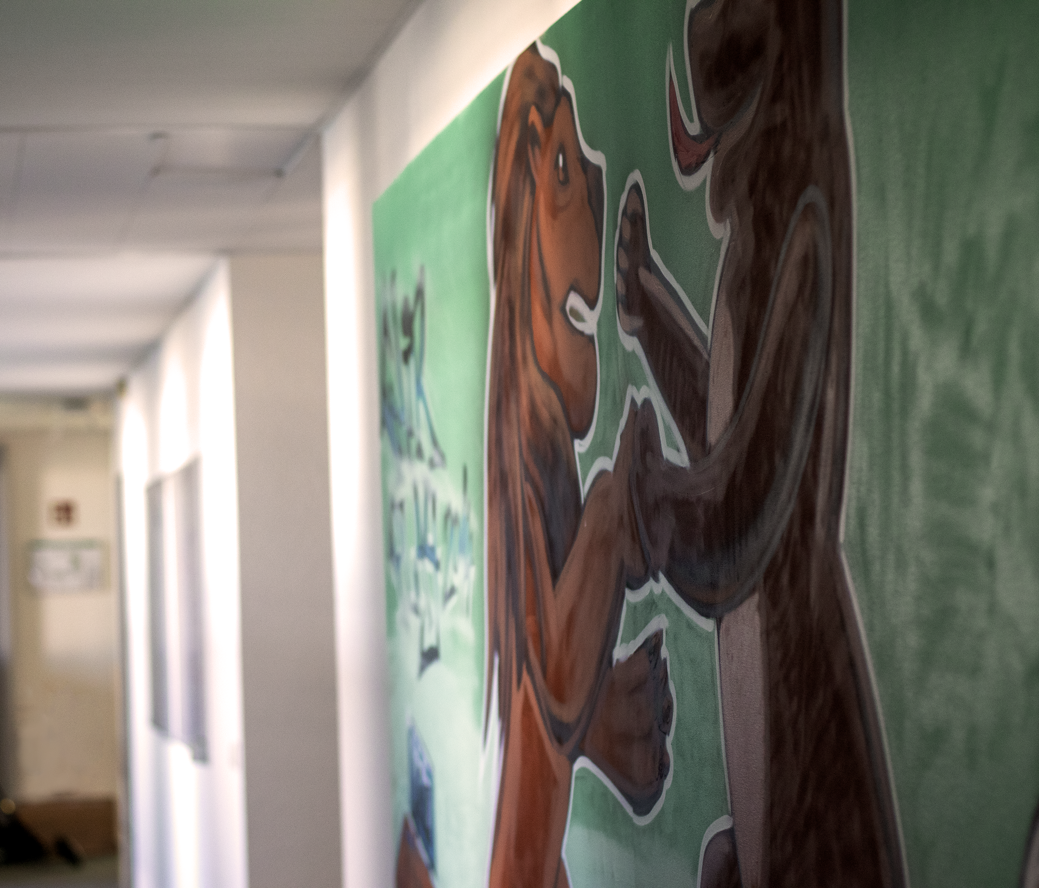 Löwe und Bär auf eine Wand gesprüht als Symbolik für Lübeck und Berlin